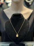 Elegant Gold-Tone Rectangular Pendant Necklace with Crystal Stone