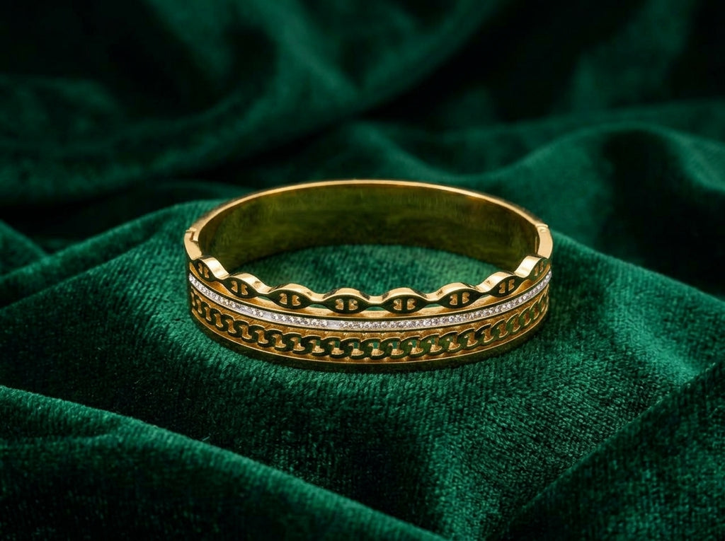 Elegant Gold-Tone Multi-Texture Bangle with Crystal Accent