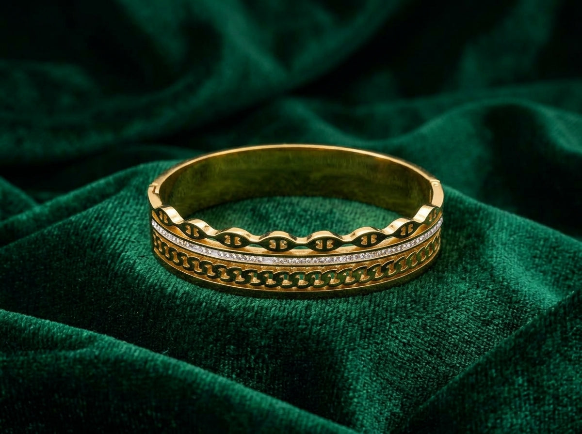 Elegant Gold-Tone Multi-Texture Bangle with Crystal Accent
