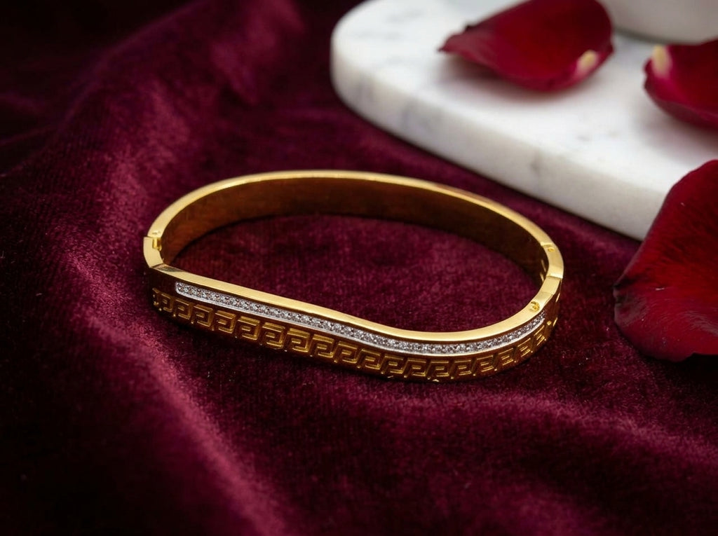 Elegant Gold-Tone Curved Bangle with Crystal Line & Geometric Engraving
