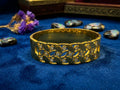 Elegant Gold Leaf Motif Bangle with Stone Accents