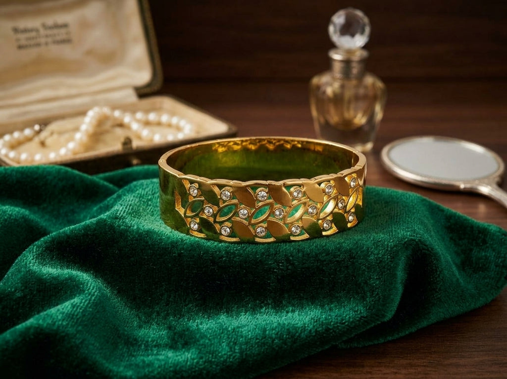Elegant Gold Leaf Motif Bangle with Stone Accents