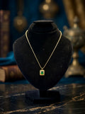 Elegant Gold-Tone Rectangular Pendant Necklace with Green Stone