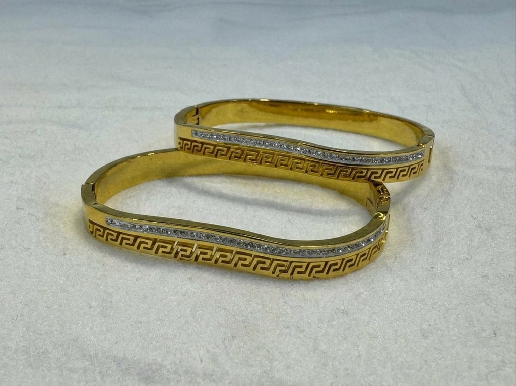 Elegant Gold-Tone Curved Bangle with Crystal Line & Geometric Engraving